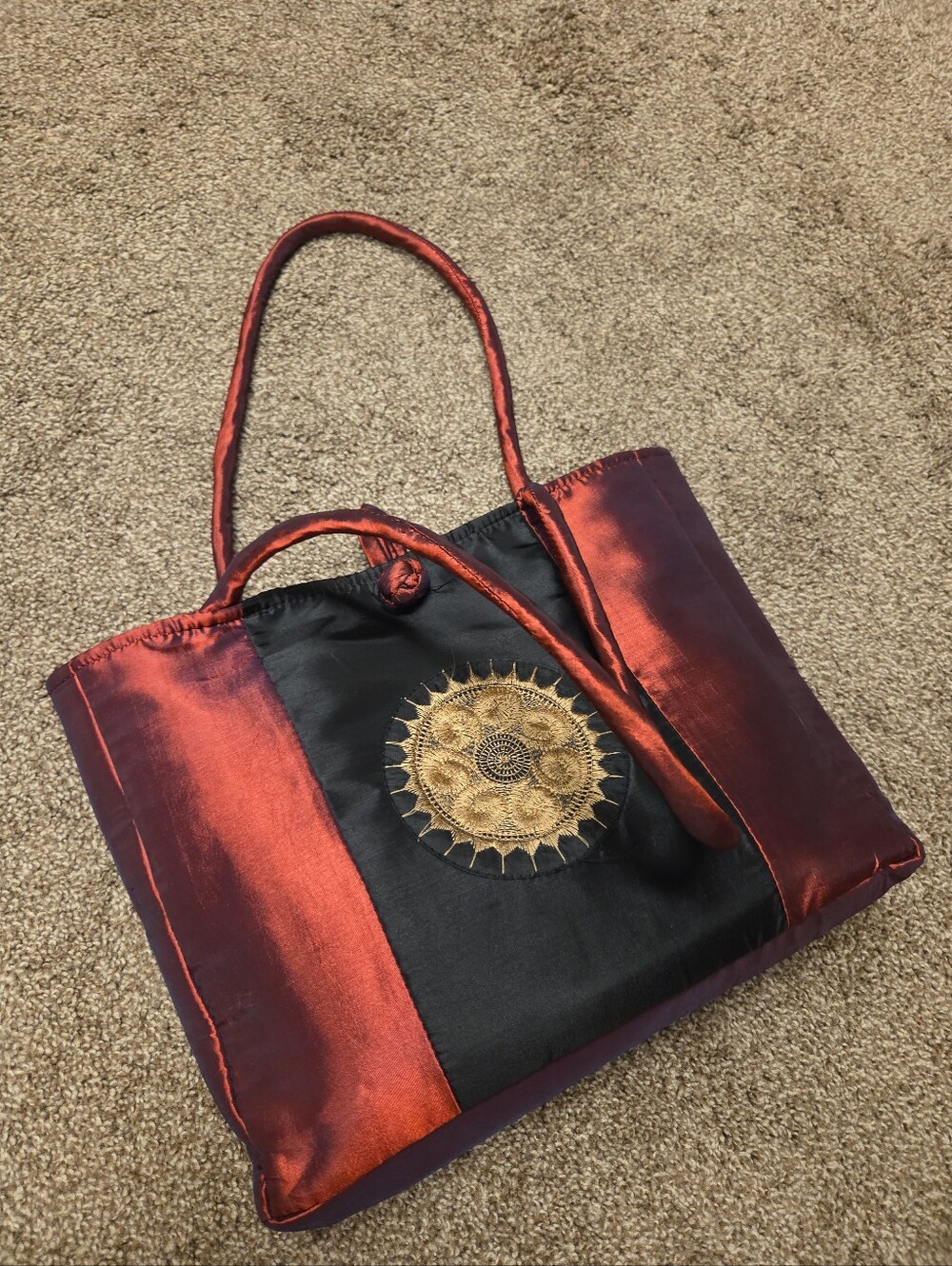 Silk-Inspired Red and Black Tote Bag with Gold Sun Embroidery